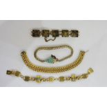 Gold-plated, turquoise and ruby set serpent bracelet, two foreign gilt metal bracelets and gold-