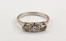 White metal three-stone diamond ring, set with graduated brilliant cut diamonds, finger size M1/2 (