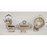 Silver-plated kettle/teapot on paraffin stand, a sugar dish, a toast rack, a lidded tureen, a