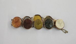 Gold-coloured metal and lava cameo portrait medallion bracelet with nine portrait medallions (some