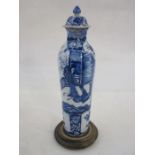 Chinese-style delft slender shouldered and tapering vase with panels of ladies in garden, in