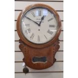 Oak drop-dial wall clock, the circular dial inscribed Marsh, Norwich, glass aperture below flanked