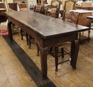 Possibly 17th century and later table, the two-plank top with later cleated end supports, on four