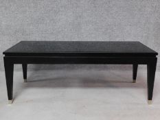 A contemporary ebonised low coffee table. H.45 W.120 D.49cm
