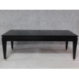 A contemporary ebonised low coffee table. H.45 W.120 D.49cm