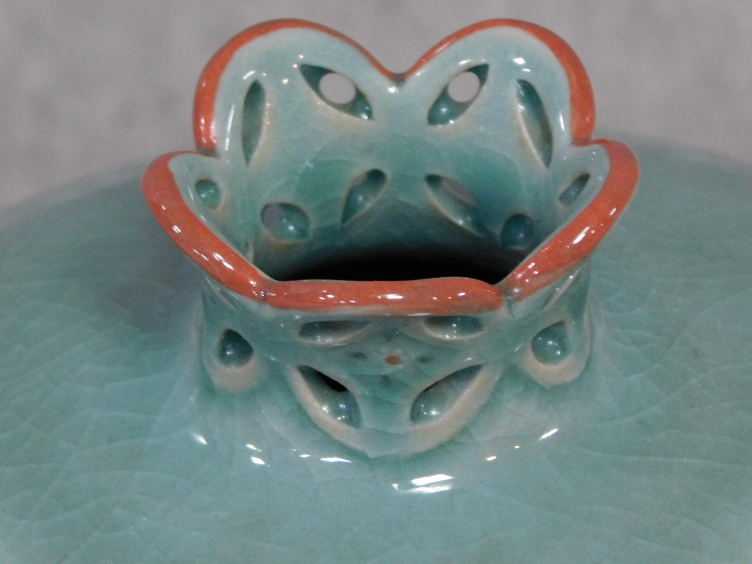 A 20th century Korean Blue celadon crackle glaze pomegranate vase with pierced neck. Artist's - Image 2 of 4