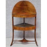A Georgian mahogany corner washstand with undertier fitted with drawer on swept supports. H.111 W.59