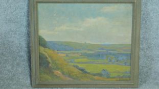 A framed oil on board by British artist Ethel Louise Rawlins (1880-1940), 'Sussex Downs', signed