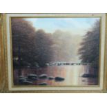 A gilt carved wood framed oil on canvas river landscape by British artist D J Lawrence. Titled' Tarn