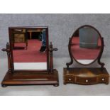 A Georgian mahogany swing frame toilet mirror fitted with base drawers and original plate and a
