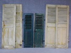 Three miscellaneous pairs of vintage distressed painted louvre window shutters. H.167 W.54cm