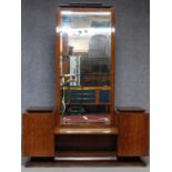 A vintage Continental Art Deco style rosewood teak and ebonised dressing table with central cheval