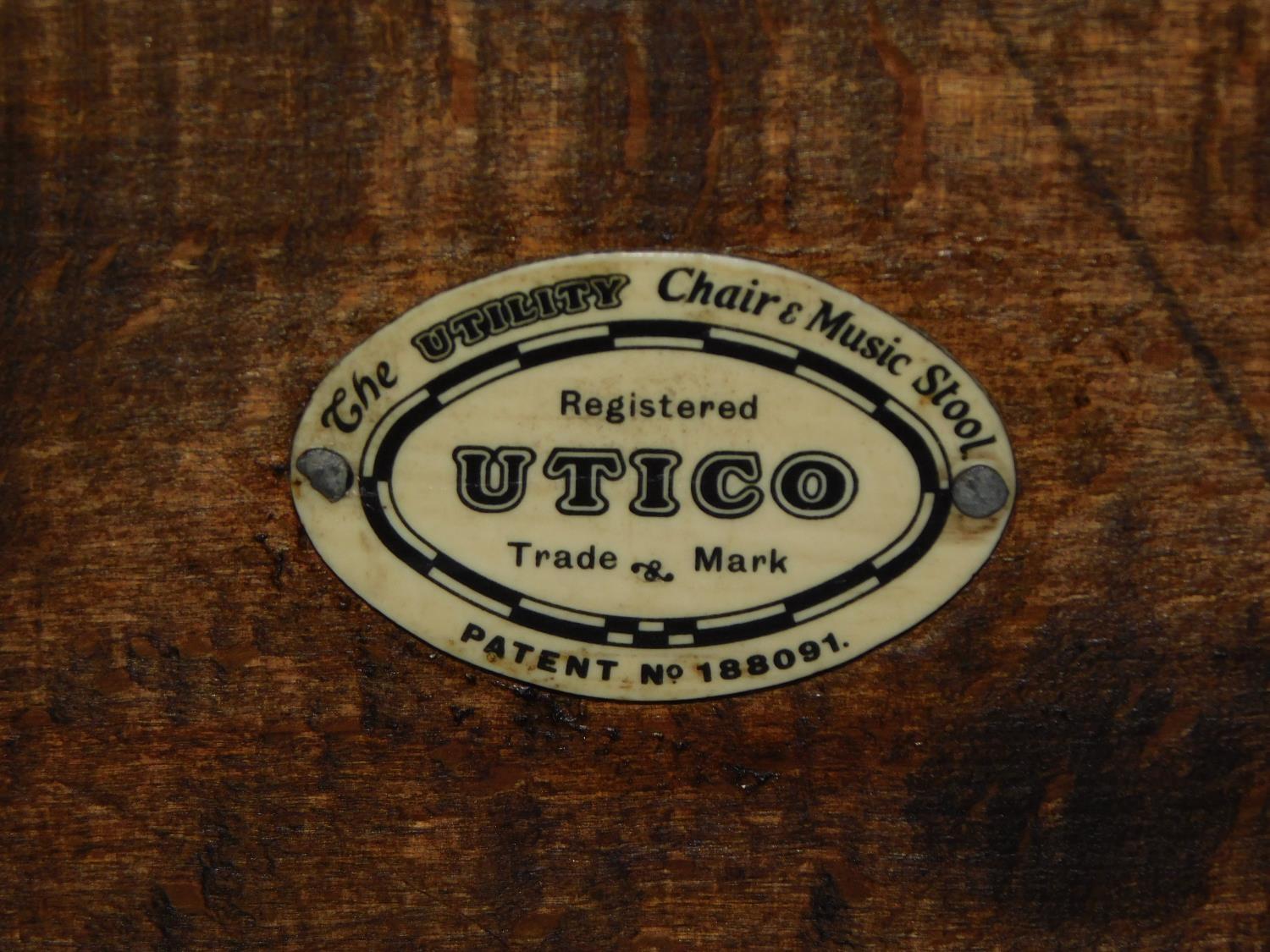A vintage beech framed Utico patent action sliding music stool, makers label to the inside sheet - Image 5 of 5