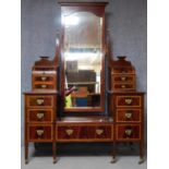 A late 19th century mahogany and satinwood inlaid dressing table fitted with central cheval mirror