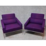 A pair of tubular framed armchairs by Fritz Hansen H.72 W.71 D.70cm