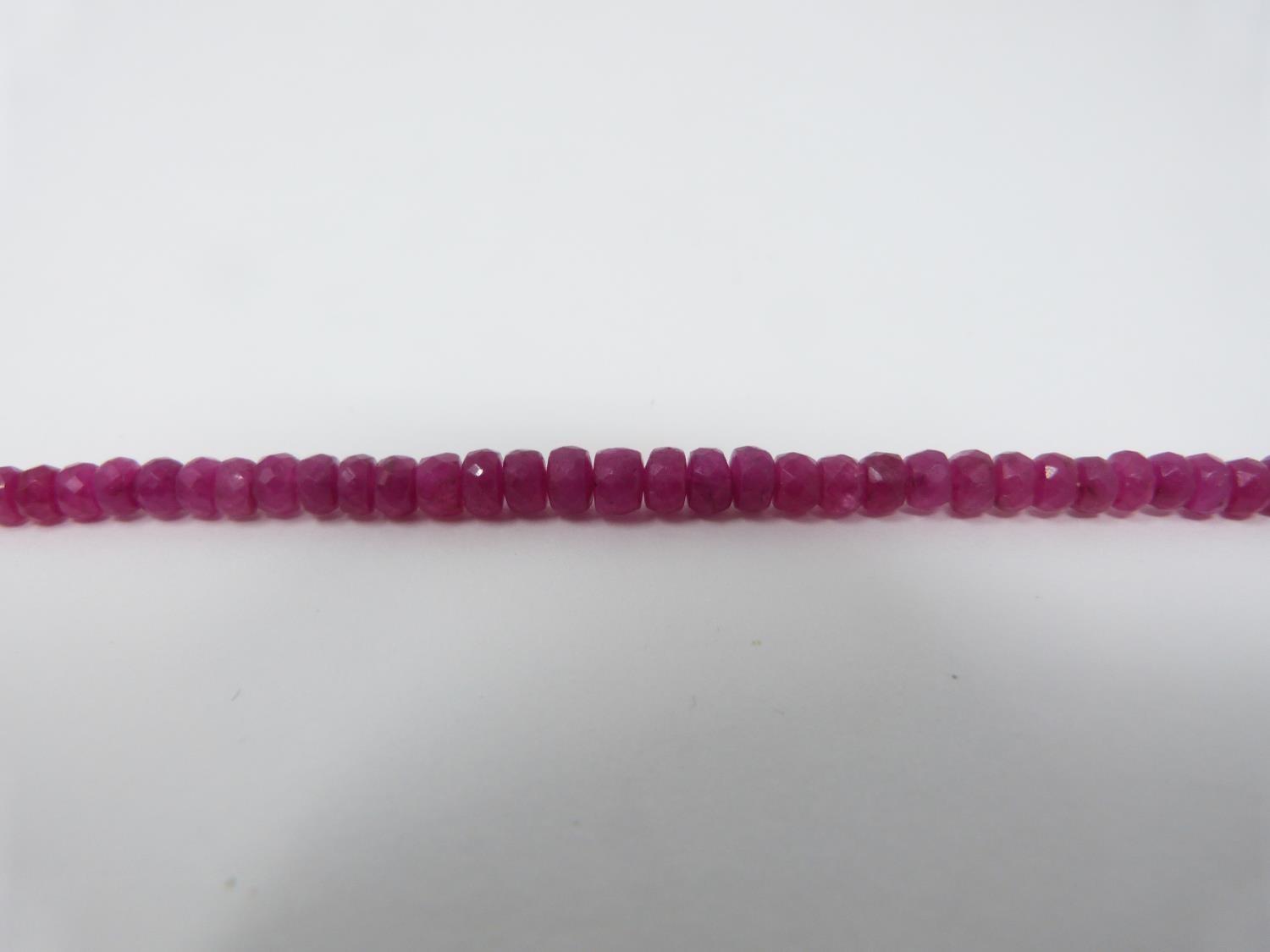 A faced graduated bead Madagascan Ruby necklace, with a total approximate weight of 75.00 carats. It - Image 4 of 4