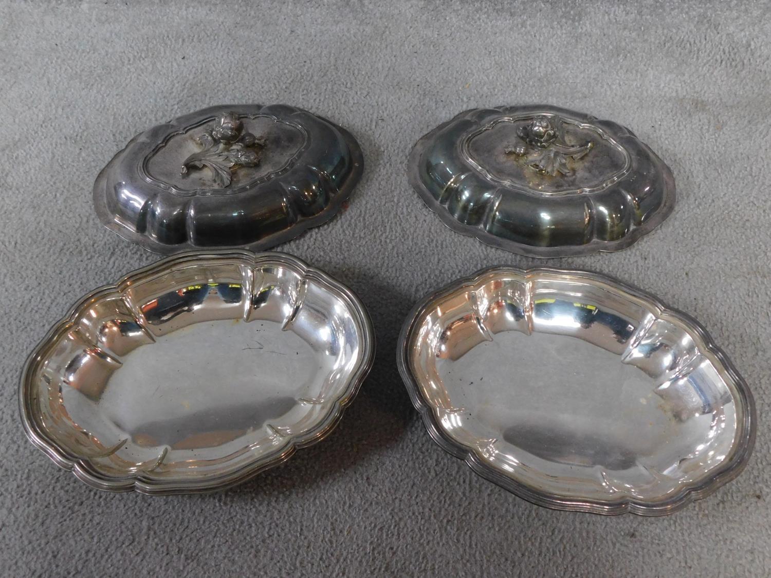 A pair of antique silver plated lidded warming dishes. With floral form and foliate sculpted - Image 2 of 4