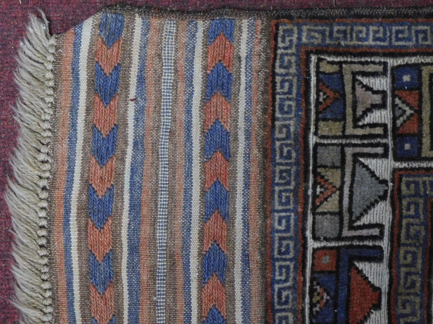 An Anatolian rug with ornate geometric design on ivory ground surrounded by multi geometric - Image 3 of 4