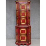 A Continental polychrome painted and lacquered two section corner cabinet. H.181 W.68 D.45cm