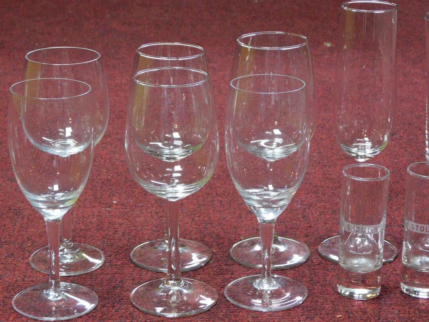 A collection of vintage glasses including a set of six brandy glasses, four engraved shot glasses, a - Image 2 of 6