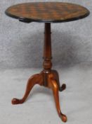 A Victorian mahogany, rosewood and satinwood inlaid chess top table on tripod cabriole supports. H.