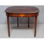 A Georgian mahogany and satinwood inlaid foldover top tea table. H.71 W.91 D.92cm