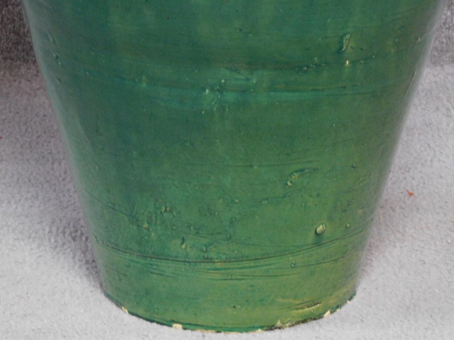 A large green drip glazed sharab wine vessel with handles. H.74cm - Image 3 of 3