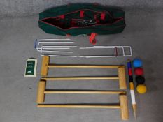 A Jacques of London complete Richmond croquet set including instruction booklet in Jaques green