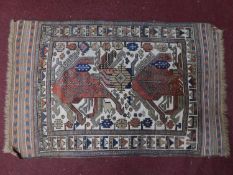 An Anatolian rug with ornate geometric design on ivory ground surrounded by multi geometric