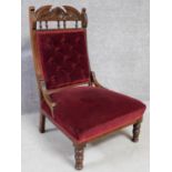 A Victorian stained beech velvet upholstered nursing chair. H.96cm