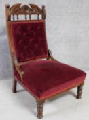 A Victorian stained beech velvet upholstered nursing chair. H.96cm