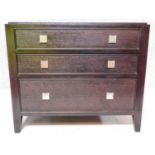 A contemporary ebonised three drawer chest. H.69 W.81 D.56cm