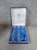 Set of six (one missing) boxed Bohemian Burgoyne lead crystal glasses made in original blue silk