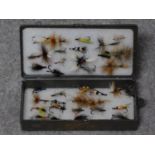 A collection of vintage fishing flies in portable case. 19x9cm (box size)