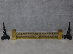 A 19th century brass fire kerb together with a pair of andirons. H.110cm