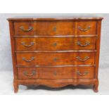 A Louis XV style mahogany chest of four long drawers on carved cabriole supports by Ralph Lauren.