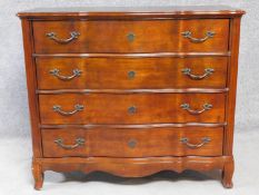A Louis XV style mahogany chest of four long drawers on carved cabriole supports by Ralph Lauren.