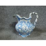 A Georgian hand painted ceramic serpent seaweed pitcher By E. Jones, Cobridge. Stamped to base '