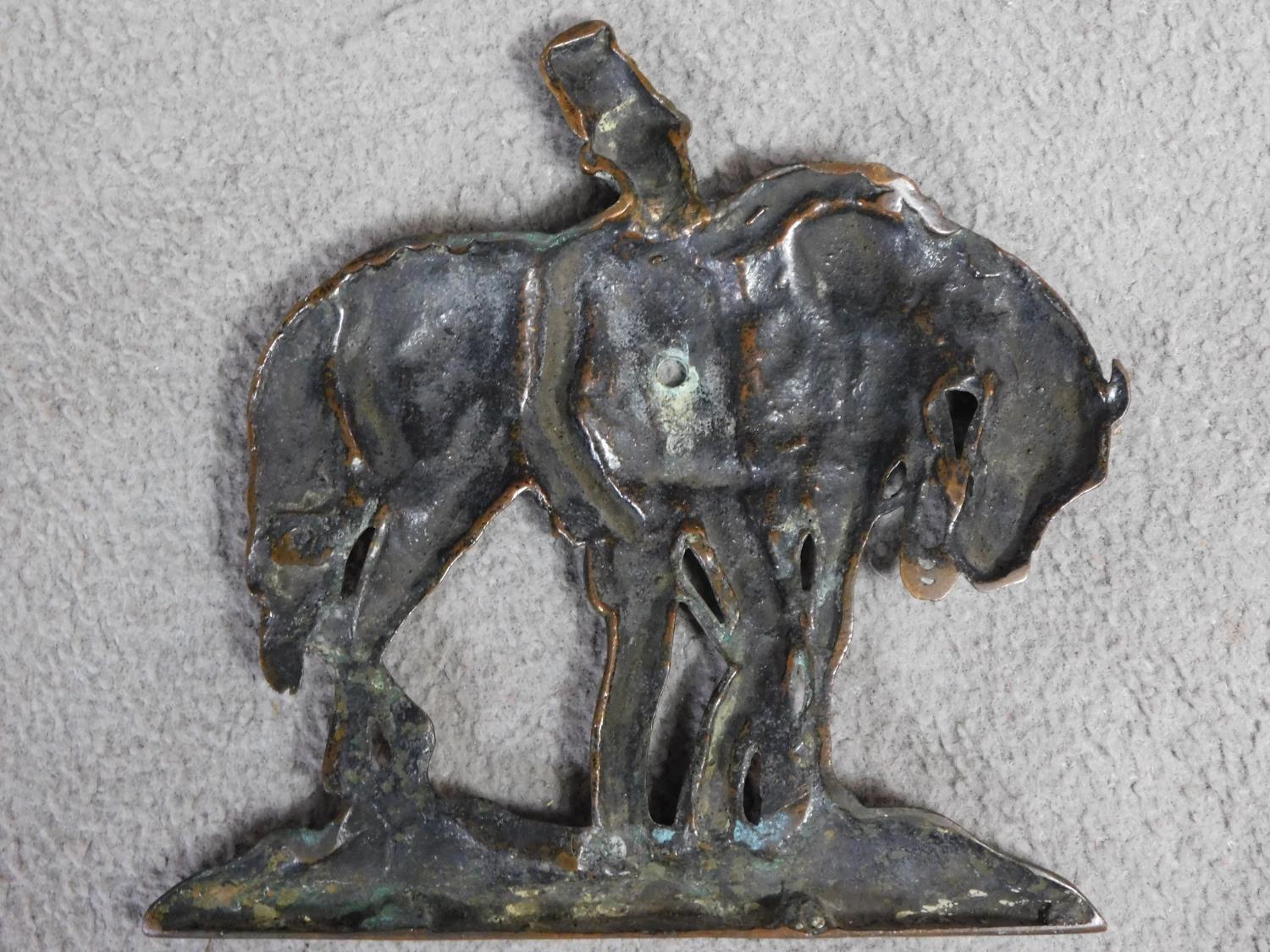 An antique bronze relief wall plaque of a soldier leaning on his horse. Indistinctly signed Jacques. - Image 7 of 7