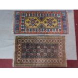 An antique Baluch rug, Persia, c.1900, c. 140 x 90 cm A modern Turkish rug, 20th century, 178x76cm