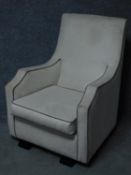 An Art Deco style armchair in faux suede upholstery. H.96 W.76 D.80cm