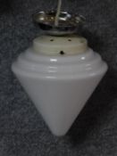 An Art Deco Bakelite and milk glass conical hanging ceiling lamp. 20x25cm