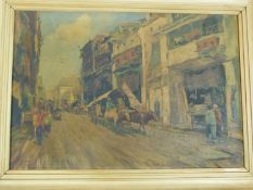 A framed oil on panel depicting a South East Asian market street, indistinctly signed. 73x54.5