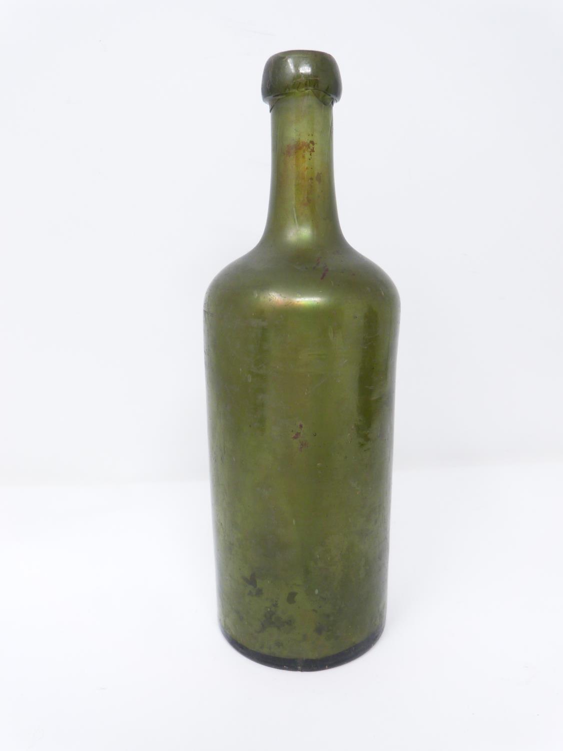 Three 18th century glass wine bottles. Two brown mallet shaped bottles and one green cylindrical - Image 4 of 8