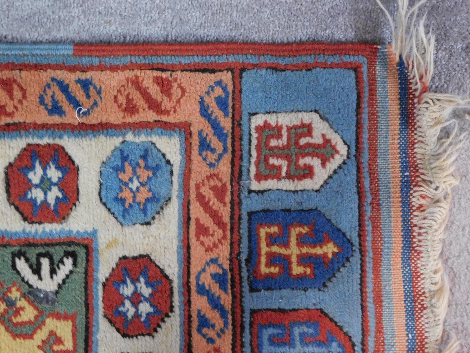 An antique Baluch rug, Persia, c.1900, c. 140 x 90 cm A modern Turkish rug, 20th century, 178x76cm - Image 3 of 7