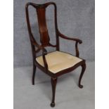 An Edwardian mahogany and satinwood inlaid armchair on cabriole supports. H.105cm