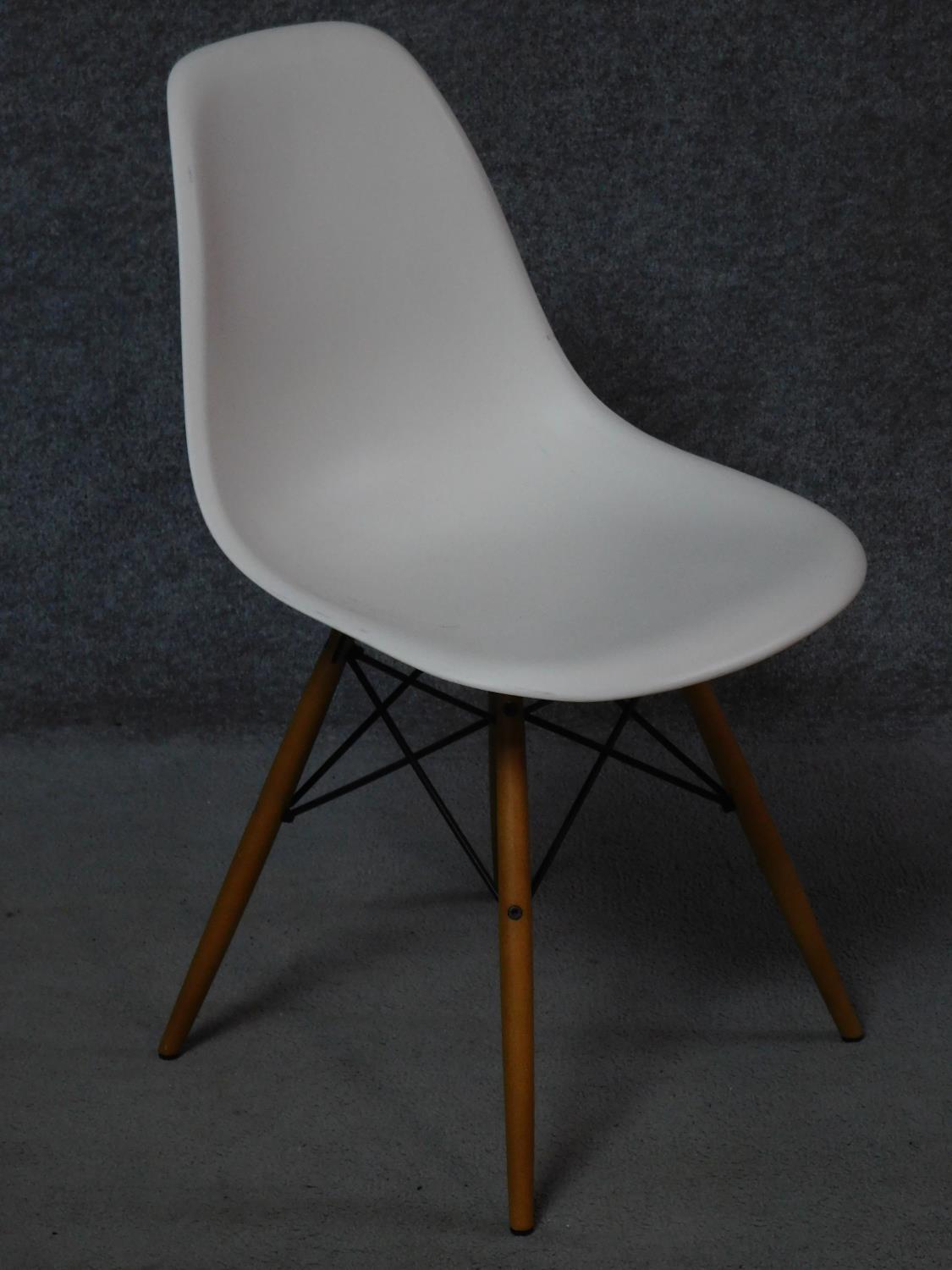A pair of Eames Vitra dining chairs and a similar chair. H.82cm - Image 2 of 4