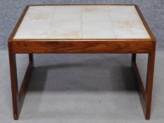 A vintage teak low coffee table with ceramic tile inset top. H.40 L.45 W.65cm