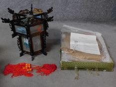 Two Chinese hand painted palace lamps. (one never used, still in its package). H.41cm