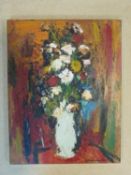 A framed oil on board still life, indistinctly signed. 57x67cm.